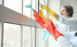 9b072699-mature-couple-cleaning-window-their-flat-1-1-1-1-1-1.png